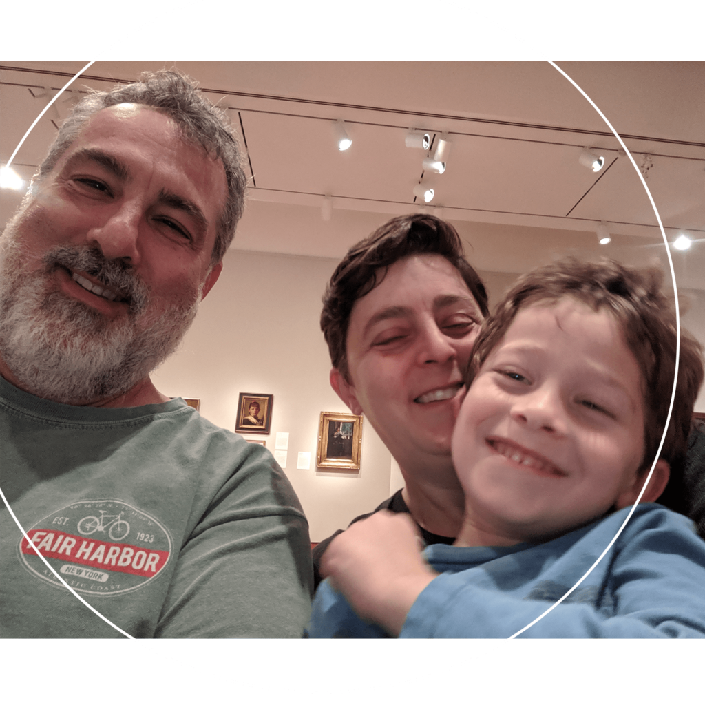 Hal and his family taking a selfie in a museum