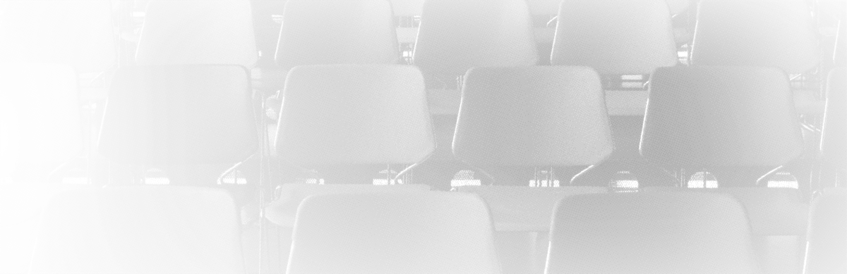 Rows of empty chairs in a classroom
